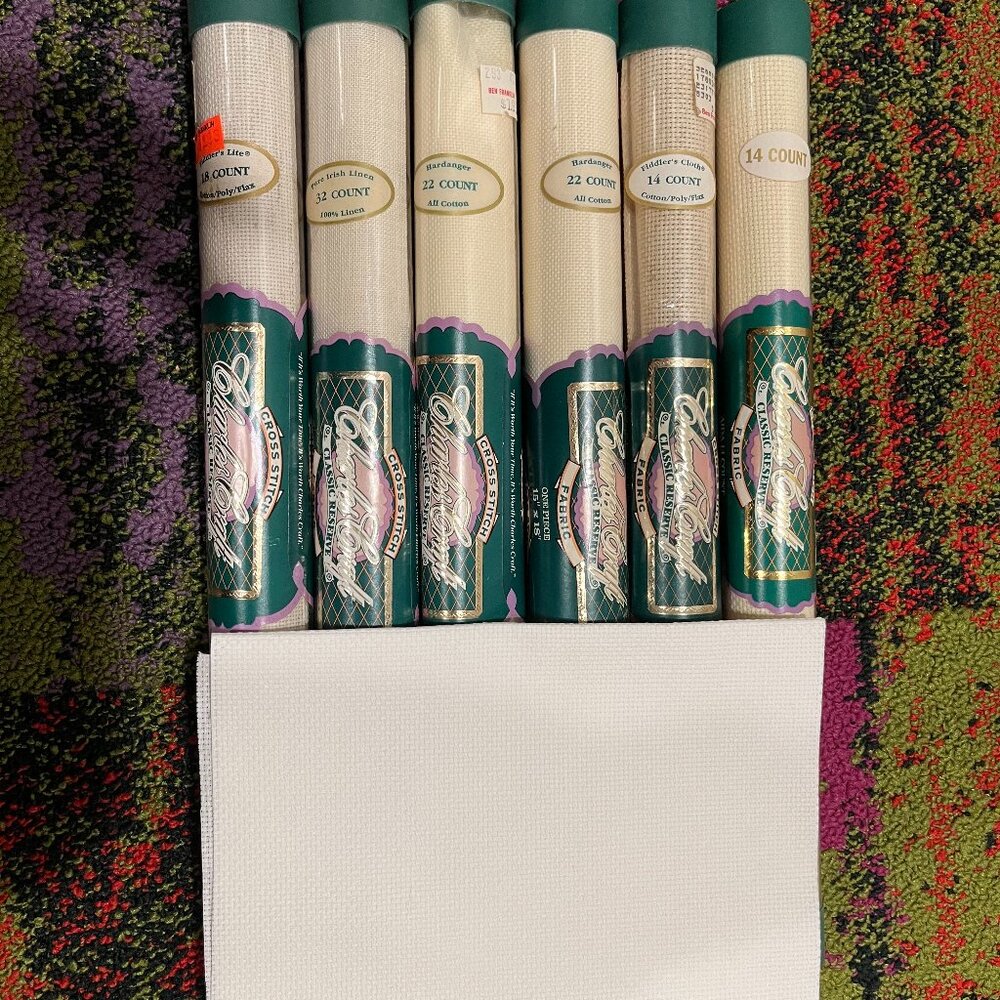 bundle of cross stitch fabric